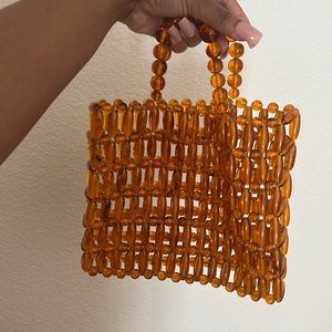 Orange beaded beach bag